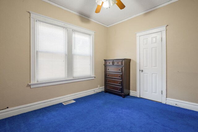 7545 S Ridgeland Ave, Chicago, IL 60649 - bedroom featuring ornamental molding, dark colored carpet, and a ceiling fan
