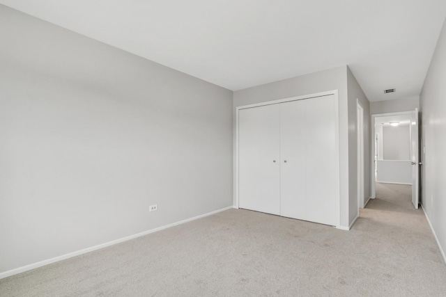 17525 W Walnut Ln, Gurnee, IL 60031 - unfurnished bedroom featuring light colored carpet and a closet