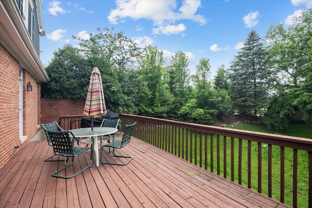 850 Evergreen Way, Highland Park, IL 60035 - wooden terrace featuring outdoor dining area and a lawn