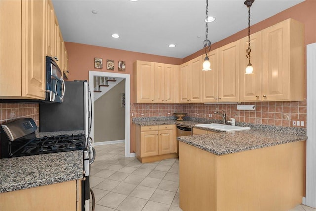 850 Evergreen Way, Highland Park, IL 60035 - kitchen with appliances with stainless steel finishes, backsplash, light brown cabinetry, light tile patterned flooring, and recessed lighting