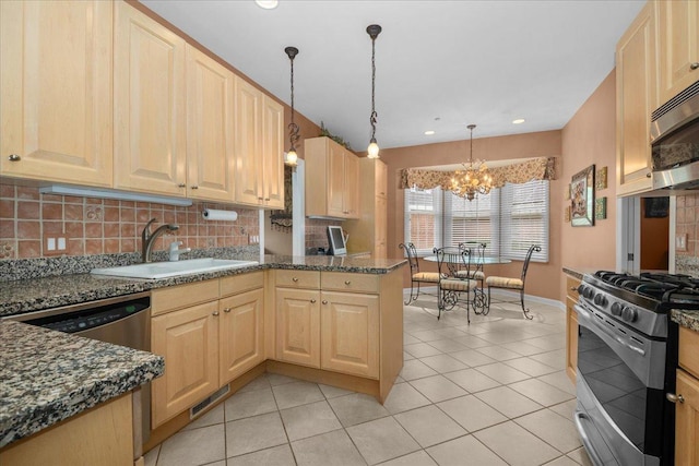 850 Evergreen Way, Highland Park, IL 60035 - kitchen featuring appliances with stainless steel finishes, a chandelier, decorative backsplash, light tile patterned floors, and light brown cabinetry