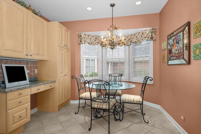 850 Evergreen Way, Highland Park, IL 60035 - dining space with plenty of natural light, built in desk, a chandelier, light tile patterned floors, and recessed lighting