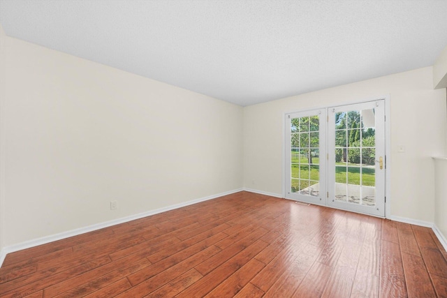 13659 W Cedarbend Dr, Homer Glen, IL 60491 - spare room with hardwood / wood-style flooring and baseboards