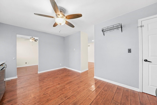 13659 W Cedarbend Dr, Homer Glen, IL 60491 - spare room featuring ceiling fan and light wood-type flooring