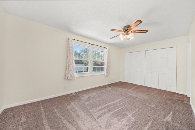 13659 W Cedarbend Dr, Homer Glen, IL 60491 - unfurnished bedroom featuring carpet flooring, ceiling fan, and a closet