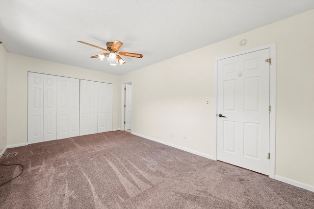 13659 W Cedarbend Dr, Homer Glen, IL 60491 - unfurnished bedroom with carpet, a closet, and a ceiling fan