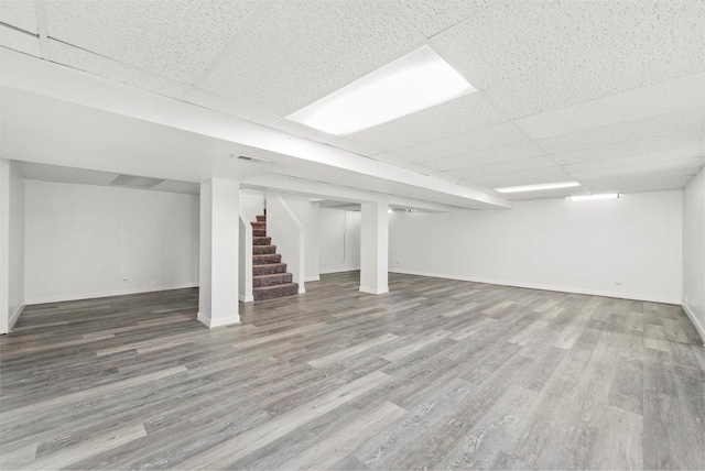 13659 W Cedarbend Dr, Homer Glen, IL 60491 - finished basement with wood finished floors, stairway, and a drop ceiling