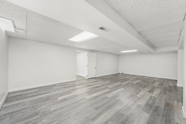 13659 W Cedarbend Dr, Homer Glen, IL 60491 - finished below grade area with a drop ceiling and wood finished floors