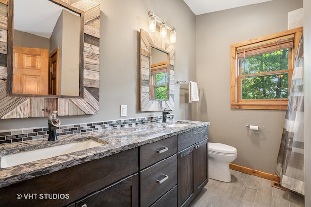 723 N River Rd, Algonquin, IL 60102 - bathroom with double vanity and wood finished floors