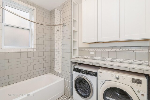 1133 N Spaulding Ave, Chicago, IL 60651 - laundry area with washing machine and dryer and cabinet space