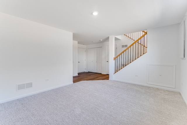 1905 Neubauer Cir Unit 1003, Lindenhurst, IL 60046 - unfurnished living room featuring carpet, stairway, and recessed lighting