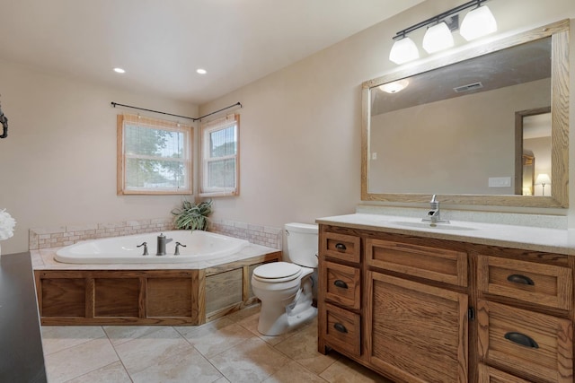 525 Palmer Ave, Aurora, IL 60506 - full bathroom featuring a garden tub, vanity, tile patterned floors, and recessed lighting