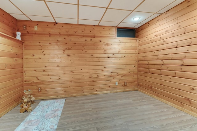 525 Palmer Ave, Aurora, IL 60506 - unfurnished room with wooden walls, a drop ceiling, wood finished floors, and recessed lighting