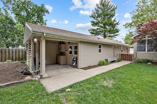 525 Palmer Ave, Aurora, IL 60506 - back of house featuring roof with shingles