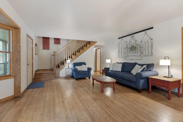 525 Palmer Ave, Aurora, IL 60506 - living room featuring stairway and wood finished floors