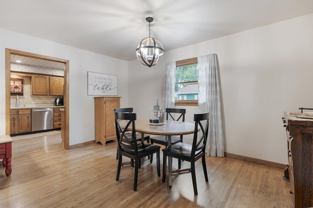 525 Palmer Ave, Aurora, IL 60506 - dining area with a chandelier and light wood finished floors