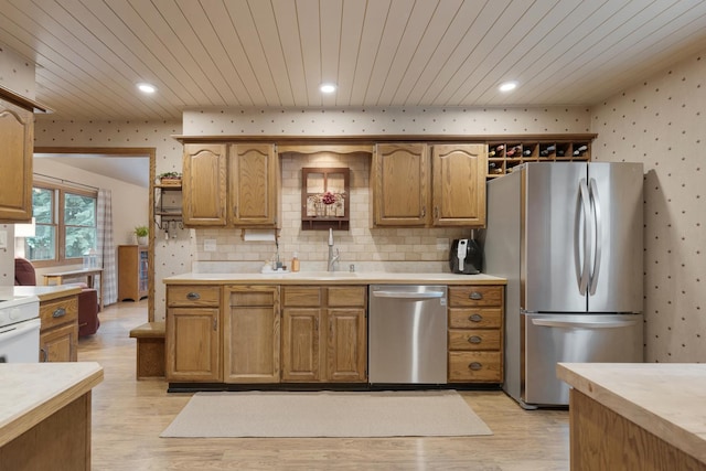 525 Palmer Ave, Aurora, IL 60506 - kitchen with appliances with stainless steel finishes, wallpapered walls, light countertops, light wood finished floors, and wooden ceiling