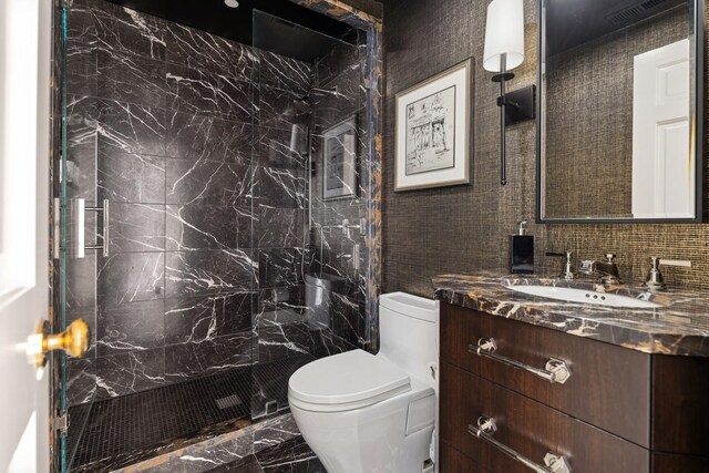219 E Lake Shore Dr Unit 8C, Chicago, IL 60611 - bathroom featuring marble finish flooring, vanity, and a marble finish shower