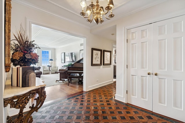 219 E Lake Shore Dr Unit 8C, Chicago, IL 60611 - foyer with a chandelier, ornamental molding, and dark flooring