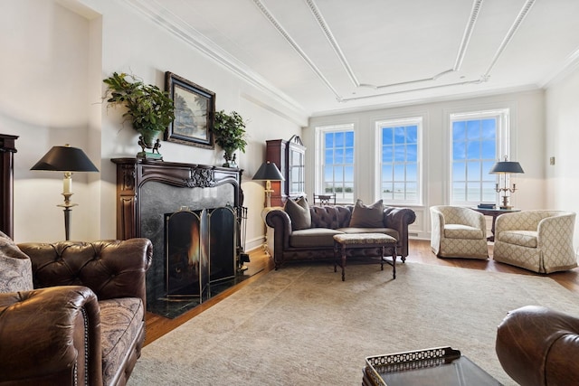 219 E Lake Shore Dr Unit 8C, Chicago, IL 60611 - living area featuring a high end fireplace, wood finished floors, and crown molding
