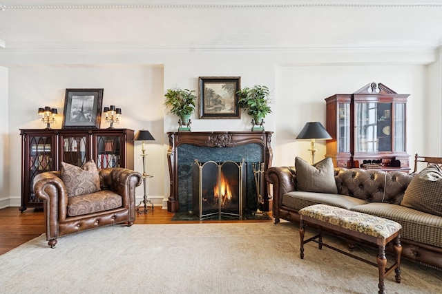 219 E Lake Shore Dr Unit 8C, Chicago, IL 60611 - sitting room with ornamental molding, wood finished floors, and a fireplace