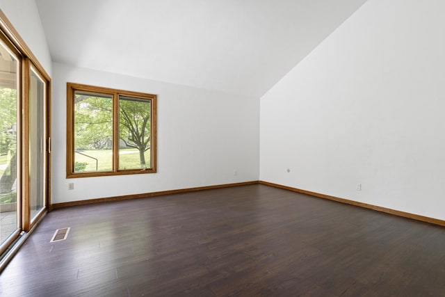 5357 Winding Creek Dr Unit 5357, Rockford, IL 61114 - unfurnished room featuring vaulted ceiling and dark wood-style flooring