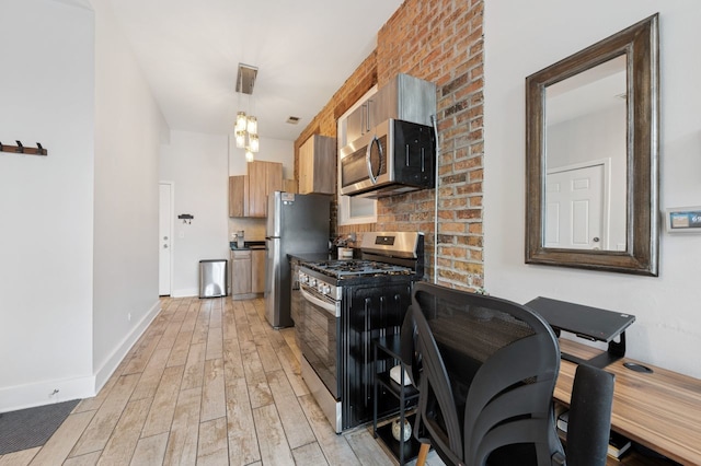 1423 N Ashland Ave Unit 201, Chicago, IL 60622 - kitchen with stainless steel appliances, light wood finished floors, brown cabinets, a chandelier, and decorative backsplash