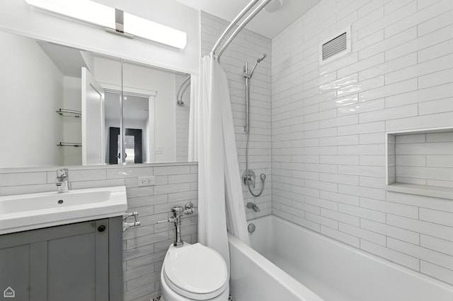 3150 N Lake Shore Dr Unit 29F, Chicago, IL 60657 - bathroom featuring shower / bath combination with curtain, vanity, and tile walls