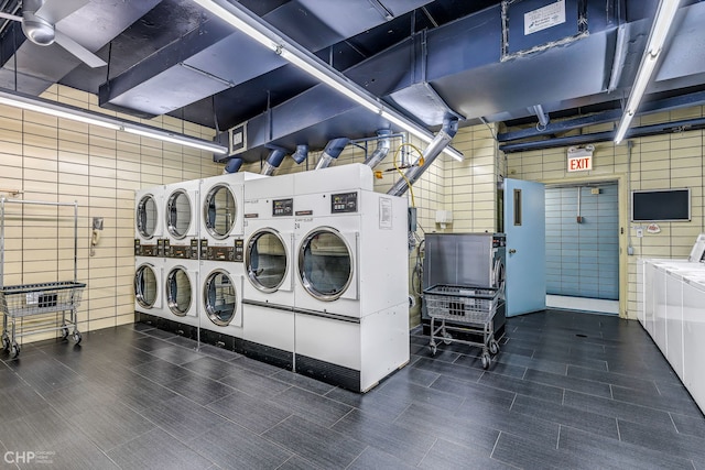 3150 N Lake Shore Dr Unit 29F, Chicago, IL 60657 - communal laundry room with independent washer and dryer and tile walls
