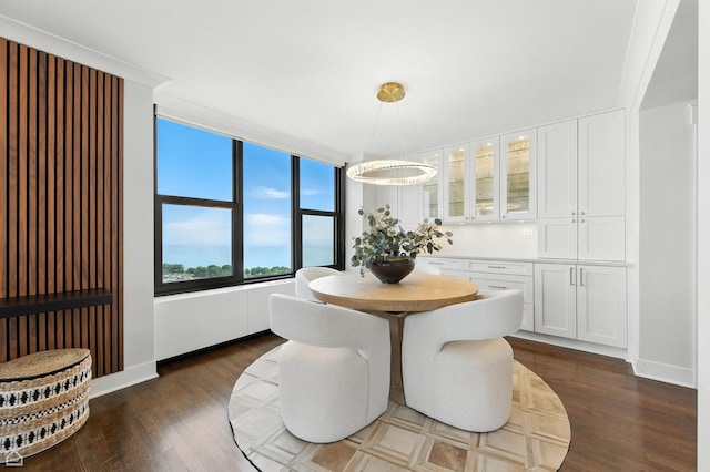 3150 N Lake Shore Dr Unit 29F, Chicago, IL 60657 - dining space with dark wood-type flooring and baseboards