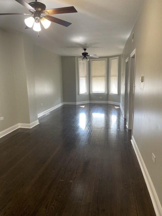 6239 S Bishop St, Chicago, IL 60636 - empty room featuring dark wood-type flooring and ceiling fan
