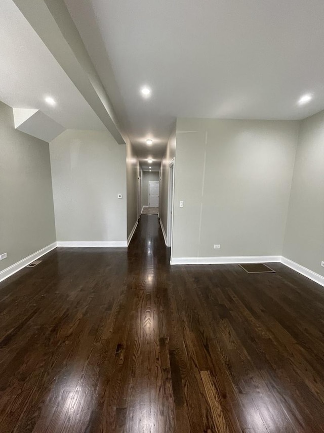 6239 S Bishop St, Chicago, IL 60636 - empty room with dark wood-style floors and recessed lighting