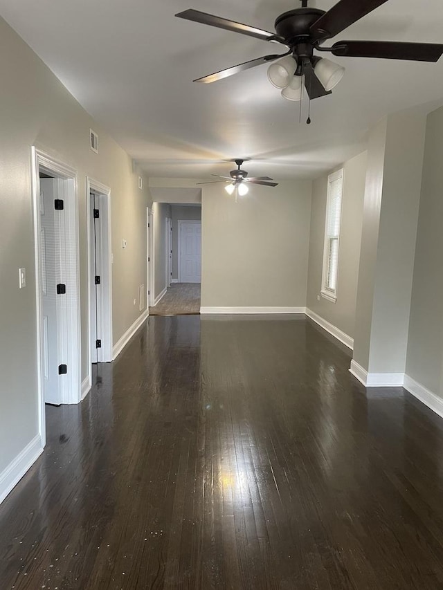 6239 S Bishop St, Chicago, IL 60636 - unfurnished living room featuring ceiling fan and dark wood-style flooring
