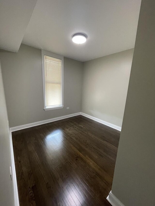 6239 S Bishop St, Chicago, IL 60636 - unfurnished room featuring dark wood-style flooring