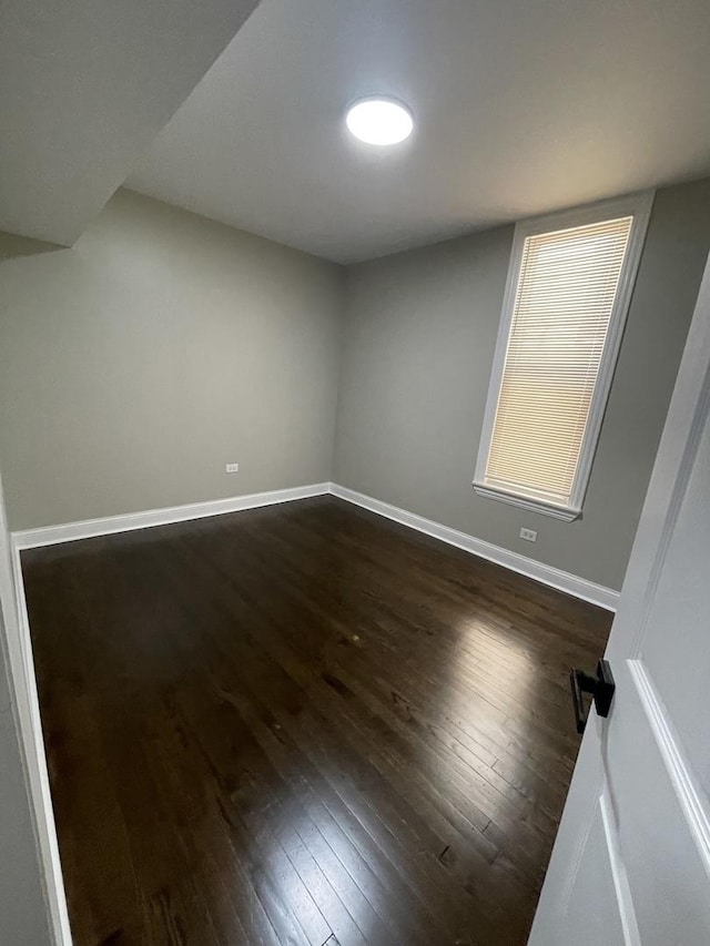 6239 S Bishop St, Chicago, IL 60636 - additional living space with dark wood finished floors and baseboards