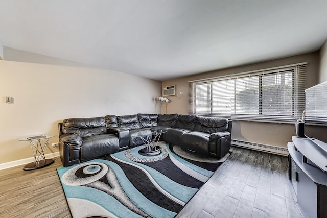 5113 N E River Rd Unit 1M, Chicago, IL 60656 - living room featuring baseboard heating, wood finished floors, and a wall mounted AC