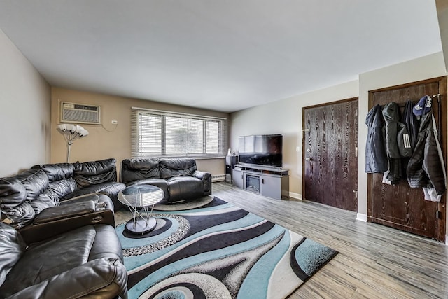 5113 N E River Rd Unit 1M, Chicago, IL 60656 - living room featuring a wall unit AC and light wood-type flooring
