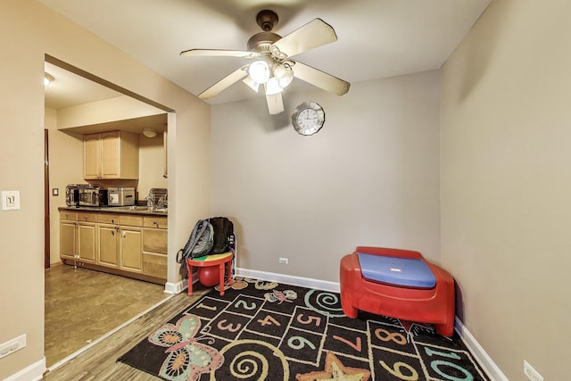 5113 N E River Rd Unit 1M, Chicago, IL 60656 - game room featuring a ceiling fan and wood finished floors