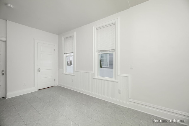 127 N W St, Wheaton, IL 60187 - unfurnished room with a wainscoted wall and a smoke detector