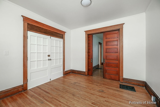 127 N W St, Wheaton, IL 60187 - entrance foyer featuring wood finished floors and crown molding