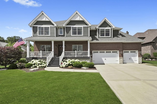 13616 S Erin Dr, Homer Glen, IL 60491 - craftsman-style house with a front lawn, driveway, a porch, roof with shingles, and stone siding