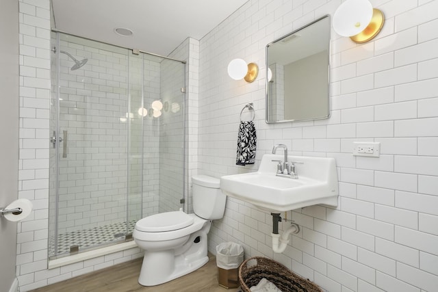 13616 S Erin Dr, Homer Glen, IL 60491 - full bathroom featuring tile walls, a shower stall, and wood finished floors