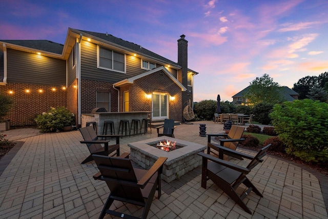 13616 S Erin Dr, Homer Glen, IL 60491 - view of patio / terrace with an outdoor fire pit