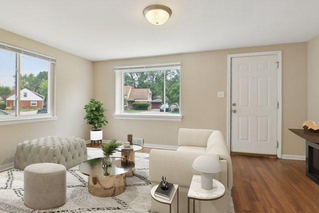 9832 S Oglesby Ave, Chicago, IL 60617 - living room featuring plenty of natural light and wood finished floors