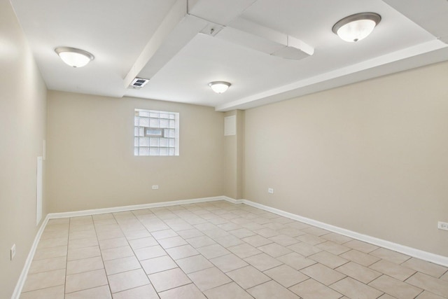 9832 S Oglesby Ave, Chicago, IL 60617 - spare room featuring light tile patterned floors and baseboards