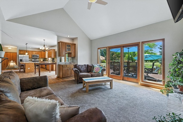 14N924 White Pines Ln, Hampshire, IL 60140 - living room featuring high vaulted ceiling, a chandelier, and ceiling fan