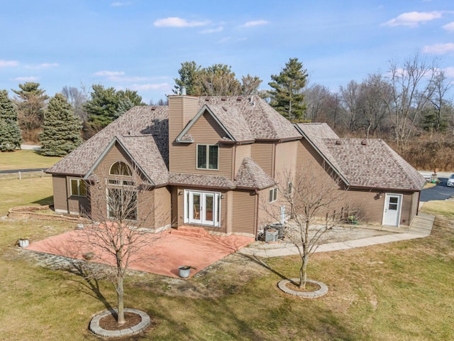 17707 W 113th Hwy, Custer Park, IL 60481 - view of front facade with french doors, a front lawn, a chimney, and a patio