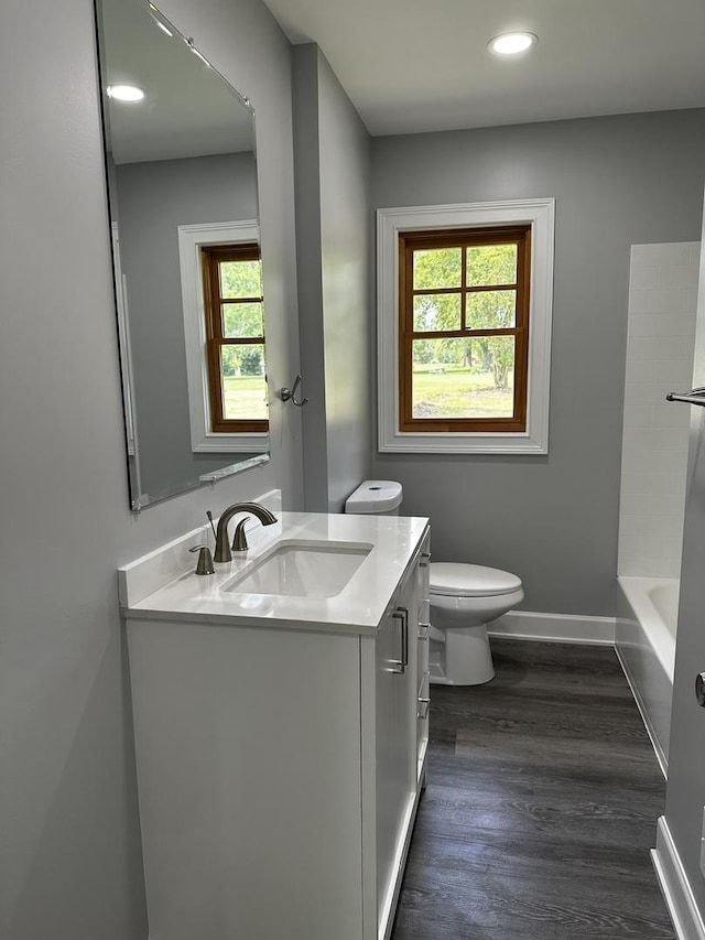 2212 N 2829th Rd, Marseilles, IL 61341 - full bath featuring vanity, wood finished floors, recessed lighting, and shower / bath combination