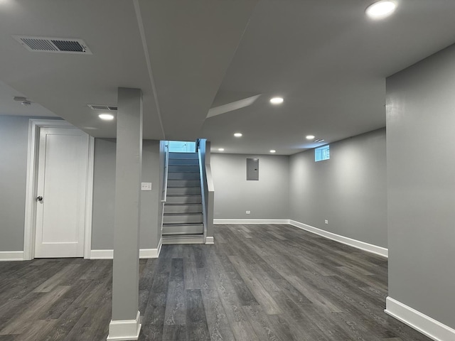 2212 N 2829th Rd, Marseilles, IL 61341 - basement featuring dark wood-style floors, stairs, and recessed lighting