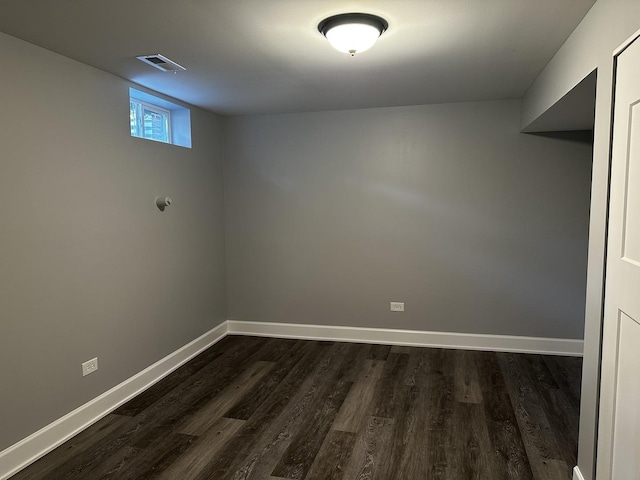 2212 N 2829th Rd, Marseilles, IL 61341 - unfurnished room with dark wood-style flooring and baseboards